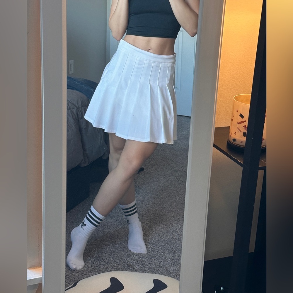 white pleated skirt